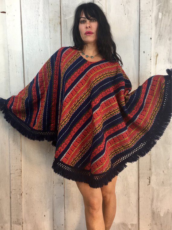 Love This Vintage Poncho!Vibrant Gorgeous Colors and PatternFolk ArtHandmadeHandwovenHand EmbroideredFeels like CottonExcellent Condition!One Size Fits Most!Length~30" Folk Style Festival Poncho One Size, Handmade One-size Folk Poncho, Traditional Fringe Poncho One Size, Traditional One Size Woven Poncho, Handwoven Poncho Shawl For Festivals, Handwoven Festival Poncho Shawl, Bohemian Handwoven Shawl Poncho, Bohemian Handwoven One-size Cape, One Size Folk Style Poncho Shawl