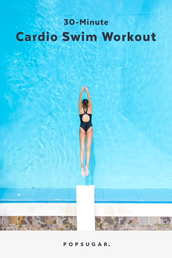 a woman in a black swimsuit standing on the edge of a swimming pool with text overlay reading 30 - minute cardio swim workout