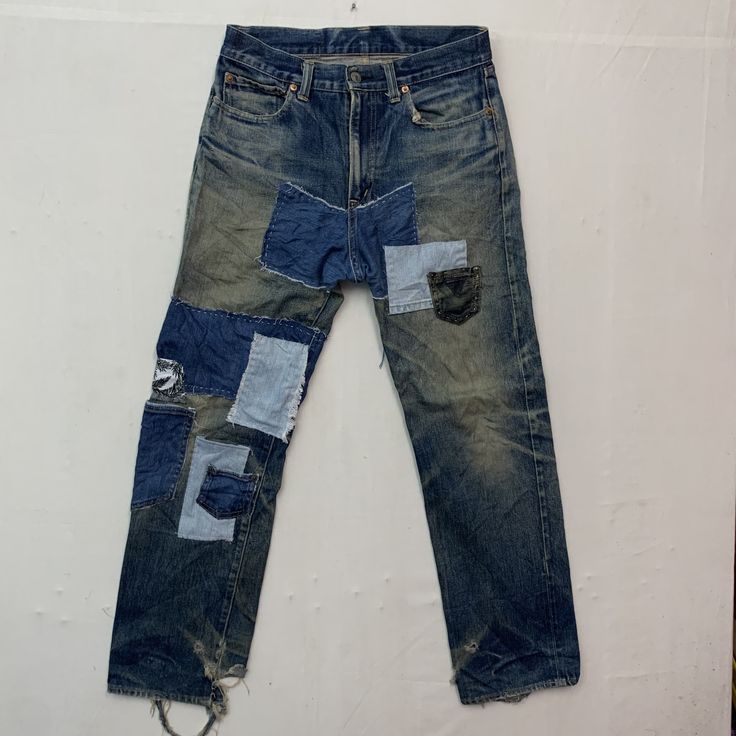 [DESCRIPTION] Please read the description first before buy my items‼️‼️‼️ Vintage Blue Blue Indigo Patchwork Distressed Denim Jeans All in good condition [MATERIAL] Cutton [MEASUREMENT] Measurement ( WHEN LAID FLAT ): Waist: 30 inch (recommended) Insean: 28 inch Length: 38 inch Front Rise: 11.5 inch Thigh: 19 inch Opening Leg: 16 inch [CONDITION] - All in good condition  [PAYMENT & NOTICE] - We accept PayPal ONLY - No return/refund - All items will be post over shipping company counter within 1- Pre-washed Recycled Denim Blue Bottoms, Pre-washed Indigo Denim Bottoms, Pre-washed Recycled Denim Blue Jeans, Patchwork Rigid Denim Jeans In Dark Wash, Faded Denim Patchwork Jeans, Medium Wash Patched Cotton Jeans, Faded Patchwork Denim Jeans, Medium Wash Cotton Jeans With Patches, Ripped Jeans In Denim Blue Made From Recycled Denim