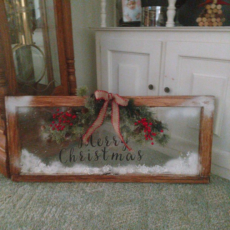 a wooden sign that says merry christmas on it