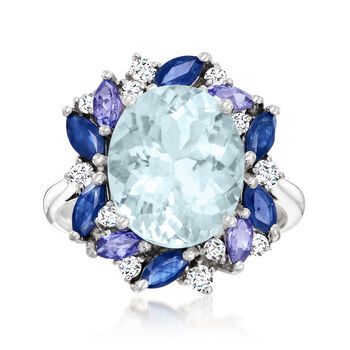 Ross-Simons - 5.80ct t. w. Multi-Gemstone, .24ct t. w. Diamond Ring Oval Cut in 14kt White Gold. Size 10. This astounding ring is brimming with captivating color. On it, a pastel 4.50 carat oval aquamarine centerpiece is encapsulated by a wreath-like halo that fuses saturated .90 ct. t. w. marquise sapphires, vivid .40 ct. t. w. marquise tanzanites and glittery sprinkles of .24 ct. t. w. round brilliant-cut diamonds. Crafted in 14kt white gold. 5/8" wide. Diamond and multi-gemstone ring. Aquamar Aquamarine Gold Ring, Sapphire Engagement Ring Halo, Diamond Ring Oval, Aquamarine Birthstone, Multi Gemstone Ring, Ring Oval, Engagement Rings Sapphire, Round Brilliant Cut Diamond, Gemstone Ring