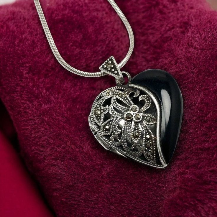 "Hello and welcome, Gorgeous, vintage, Art Deco, heart locket pendant necklace. Sterling silver set with black onyx and Marcasite. Stamped 925. Chain 16\", 925, from India." Vintage Black Jewelry For Valentine's Day, Black Vintage Jewelry For Valentine's Day, Vintage Heart-shaped Jewelry With Large Pendant, Vintage Heart Shaped Jewelry With Large Pendant, Vintage Heart-shaped Large Pendant Jewelry, Elegant Heart-shaped Large Pendant Jewelry, Black Heart Pendant Jewelry For Formal Occasions, Vintage Sterling Silver Jewelry For Valentine's Day, Black Heart-shaped Gemstone Jewelry