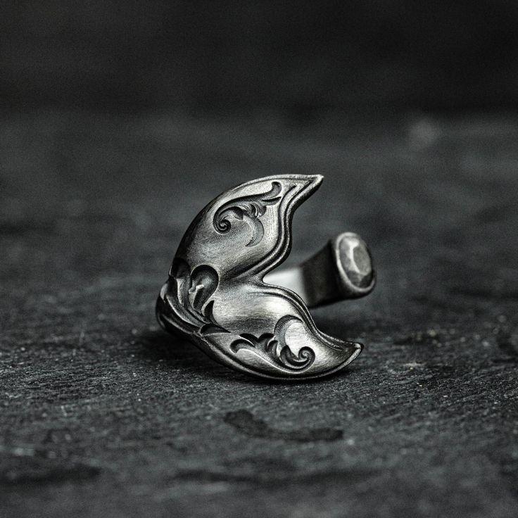 describe This Tail Ring, Whale Tail Jewelry, Whale Ring, Sea Animal Ring is cast in sterling silver and bronze and handcrafted to accentuate every nook and cranny of this beautiful sculpture. Ring face height about 25mm*width 28mm Dimensions and weights are measured by hand and may vary. Dimensions and weights may vary due to individual needs, pack: All pieces come in custom gift boxes. If you would like to include a gift description, please let us know in the Notes section during checkout. Plea Sterling Silver Engraved Open Ring Collectible, Sterling Silver Engraved Open Ring For Collectors, Handmade Antique Silver Engraved Ring, Unique Stamped Antique Silver Rings, Vintage Hand Cast Sterling Silver Signet Ring, Vintage Hand Forged Sterling Silver Signet Ring, Antique Sterling Silver Engraved Open Ring, Antique Engraved Open Ring In Sterling Silver, Adjustable Silver Brass Signet Ring