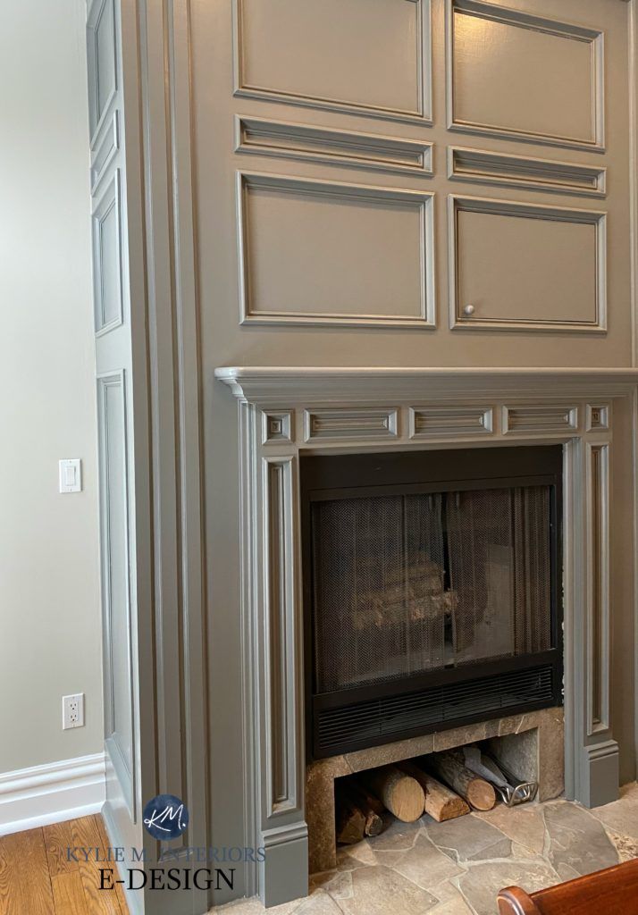 an empty fireplace in the middle of a room