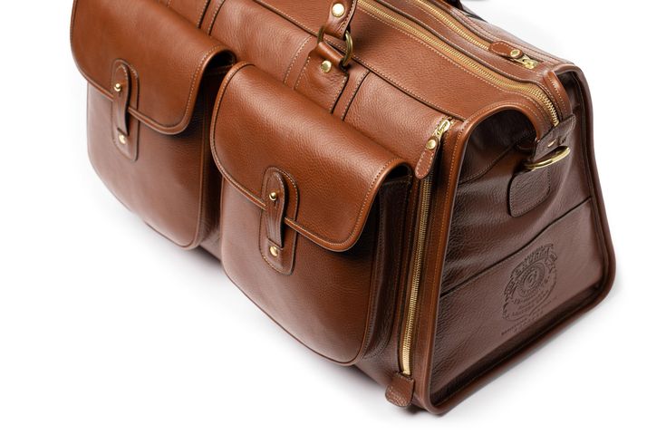 The first bag created for the Ghurka collection. A travel bag ideal for a weekend getaway. Chestnut Leather, Leather Duffle Bag, Leather Duffle, One Bag, Monogrammed Items, Flap Pocket, Weekender Bag, Chestnut, Luggage Tags