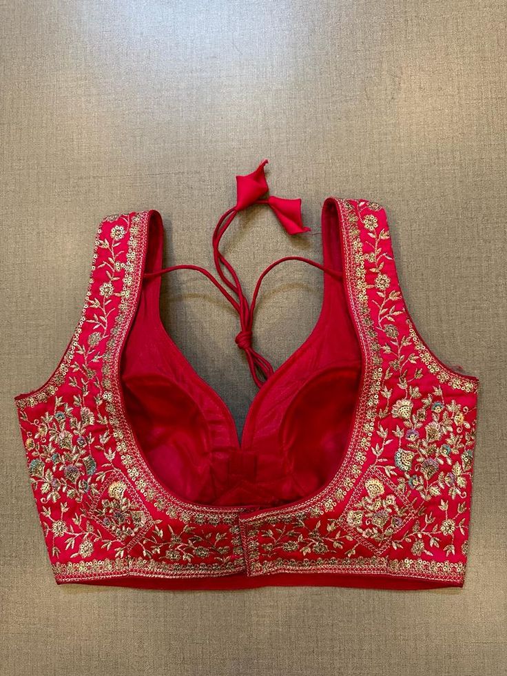 Exquisite pink heavy embroidery sleeveless saree blouse. Buy designer blouse in USA from Pure Elegance. Disclaimer: The actual product may vary slightly from the image. These are custom orders, hence expect slight variation in color, placement of the motif or buta. ESTIMATED DELIVERYBecause this is a custom order, it would take about 4 weeks from the date of purchase. RETURN POLICY: This product is a custom order and cannot be returned or exchanged. Sleeveless Saree Blouse, Sleeveless Saree, Sari Blouses, Banarasi Sari, Sleeveless Blouse Saree, Designer Saree Blouse, Saree Blouses Online, Blouse Designer, Corset Blouse