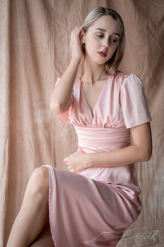 Pink V-neck Satin Dress For Formal Occasions, Pink Tea Length Evening Dress, Pink Tea-length Evening Dress, Elegant Summer Satin Dress With Ruched Detail, Feminine Summer Evening Dress With Pleated Bodice, Pink Short-sleeved Evening Dress For Wedding, Wedding Dress With Ruched Bodice And Short Sleeves, Ruched Satin Dress For Wedding, Elegant Pink Midi Dress With Pleated Bodice