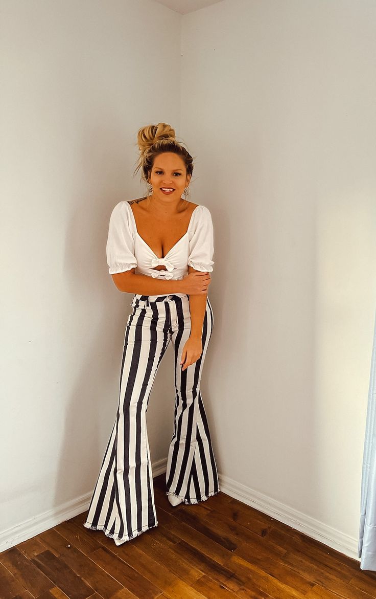 BOHO STRIPED DENIM FLARES. 97% COTTON, 3% SPANDEX. Dark Blue Stripe. Chic High Rise Jeans For Day Out, Summer Stretch White Flare Jeans, Summer Fitted Flare Jeans, Chic White Flare Bottoms, White Stretch Flare Jeans For Spring, White Stretch Flare Jeans For Summer, Spring High Waist Stretch Flare Jeans, Spring White Stretch Flare Jeans, Trendy White Flare Bottoms