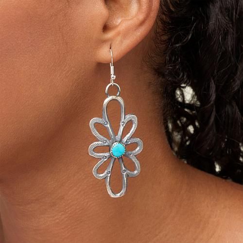 Chaco Canyon Sterling Silver Sleeping Beauty Turquoise Flower Earrings Add a fun, fashionable touch to any ensemble with these whimsical "flower" earrings. Handcrafted by Native American artisans, the sterling silver, flower-shaped drops are embellished with Sleeping Beauty turquoise, decorative textures and an oxidized finish.       Approx. 2-15/16"L x 1-1/8"W     Stamped .925     Pierced with wire backs     Earrings have open, flower-shaped drops with single, round blue turquoise in center     Textured accents     Oxidized, polished finish   Stone Information       All sizes and weights approximate     Stabilized Sleeping Beauty Turquoise - Round (8mm); mined in USA Blue Sterling Silver Earrings With Flower Charm, Elegant Turquoise Flower Earrings Nickel Free, Elegant Turquoise Nickel-free Flower Earrings, Blue Flower Charm Earrings, Elegant Turquoise Earrings With Flower Charm, Teardrop Earrings With Flower Charm, Turquoise Nickel Free Flower Earrings, Nickel Free Turquoise Flower Earrings, Turquoise Jewelry With Flower Charm