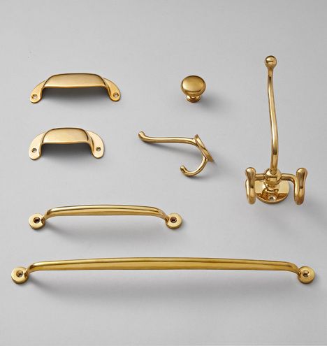 an assortment of brass handles and pulls