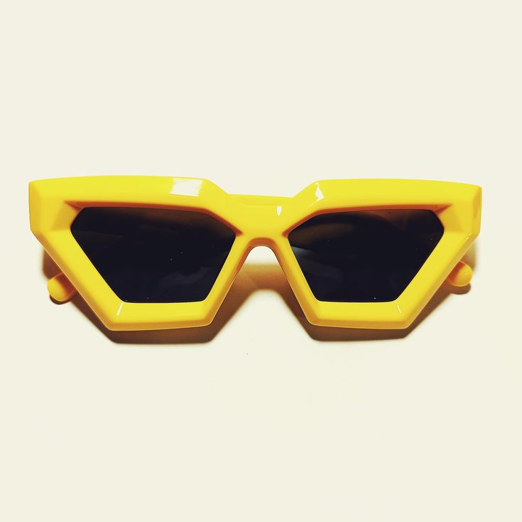 These 1970s vintage style sunglasses feature an oversized Cat-eye lens, are outlined with a chic Black rim, provide UV 400 protection. Dimensions: Length: 6 inches Lens diameter: 3x2.5 inches Cheap Vintage Yellow Sunglasses, Retro Plastic Shield Sunglasses For Party, Retro Shield Sunglasses With Gradient Lenses For Party, Retro Sunglasses With Uva Protection For Party, Retro Yellow Plastic Sunglasses, Retro Plastic Shield Sunglasses For Beach, Yellow Retro Plastic Sunglasses, Retro Party Sunglasses With Uva Protection, Retro Cat Eye Shield Sunglasses With Gradient Lenses