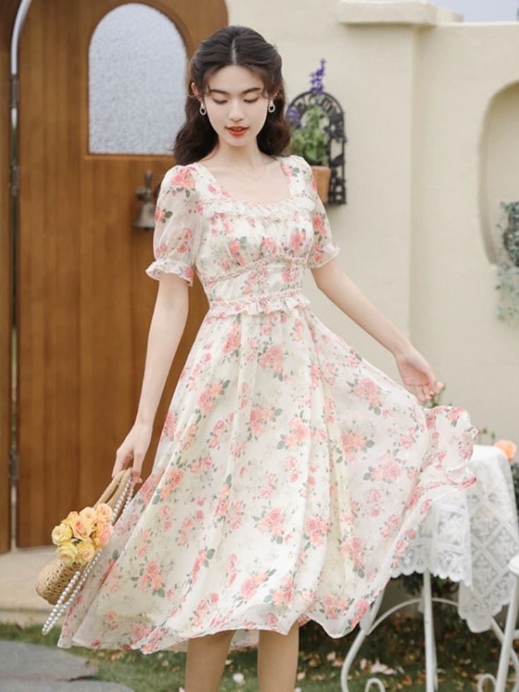 Get tea party ready this summer in this lightweight chiffon printed midi dress with a square neckline, braided details, short puff sleeves, flecks of gold and concealed back zipper. Lined. S: 33" chest, 27" waist, 44" lengthM: 34.5" chest, 28.5" waist, 44" lengthL: 36" chest, 30" waist, 44" length Feminine Chiffon Dress With Square Neck, Spring Chiffon Midi Dress With Square Neck, Spring Square Neck Chiffon Midi Dress, Chiffon Midi Dress With Square Neck, Spring Chiffon Midi Dress With Puff Sleeves, Feminine Flowy Short Sleeve Midi Dress, Short Sleeve Chiffon Midi Dress, Casual Chiffon Square Neck Dress, Casual Square Neck Chiffon Dress