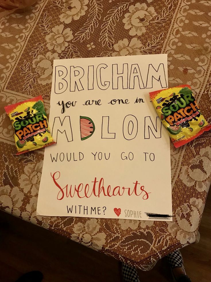 a piece of paper with some candy on top of it next to a sign that says, birmingham you are one in melon would you go to sweethearts with me?