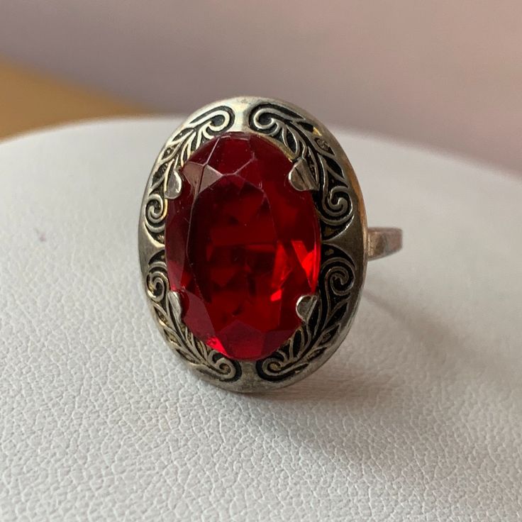 Beautiful Red Vibrant Color Oval Crystal Stone 16mm Long By 10mm Wide. The Whole "Face" Of The Ring Is 22mm Long By 16mm Wide.The Ring Is In Overall Good Vintage Condition, No Scratches To The Stone, Looks Perfect And Such A Yammi Candy Red Color, The Band Might Have Been Re-Sized , There Is A Slight Mark In The Back . It Is Stamped Inside "Sterling" .Size 7.75 .Beautiful Vintage Find ! Classic Red Ruby Ring, Oval Cabochon, Classic Red Ruby Ring With Oval Cabochon, Red Oval Cabochon Ring, Classic Red Gemstone Crystal Ring, Oval Ruby Ring For Anniversary, Red, Red Oval Cabochon Ring For Formal Occasions, Classic Red Crystal Ring Gift, Classic Red Crystal Ring As A Gift, Classic Red Crystal Ring For Gift