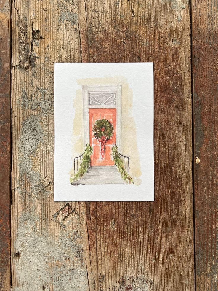 a watercolor painting of an open door with a wreath on it