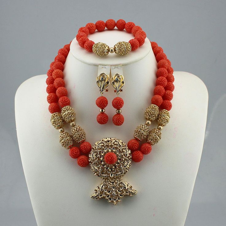 Make your wedding day truly memorable with our custom-made bridal jewelry set. Hand Set Red Jewelry For Marriage, Elegant Red Beads For Wedding, Gold Hand Set Beaded Necklaces For Wedding, Gold Hand Set Beaded Necklace For Wedding, Traditional Beaded Necklaces For Marriage, Red Beaded Jewelry For Anniversary, Red Wedding Jewelry Sets With Round Beads, Elegant Red Bridal Set For Marriage, Costume Jewelry Sets For Wedding With Round Shape