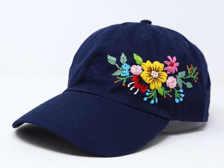 Flower is 100% hand embroidered on a 100% cotton wash baseball cap. Hat is one size fits all with adjustable back strap. Unique cap, one of a kind! I am also open for customization. If you want the item in different colors, please message me, it will take additional 2-3 days of handling time. Free first class shipping, upgradable priority mail service. 30 days return policy, feel confident at your purchase! Adjustable Navy Embroidered Hat, Spring Blue Baseball Cap With Embroidered Logo, Blue Hats With Embroidered Logo For Spring, Blue Spring Hats With Embroidered Logo, Spring Blue Hats With Embroidered Logo, Navy Spring Cap, Navy Embroidered Baseball Cap, Summer Hats With Floral Embroidery And Curved Bill, Navy Embroidered Cap