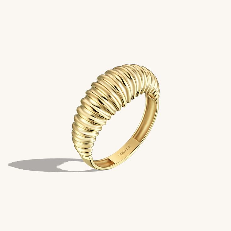 The London Dome Ring is modern, fashionable and feminine. It is an outstanding ring that elevates your style at all times with its elegantly raised and shimmering lines. - Made in 14k solid gold- Top width: 7.38 mm / 0.29 inches- Bottom width: 2.50 mm / 0.10 inches- Thickness: 1.14 mm / 0.04 inches - This product comes Byzantine Rings, Texture Jewelry, Luxury Jewelry Brands, Dome Ring, Gold Top, Solid Gold Rings, Lovely Ring, Domed Ring, Pretty Rings