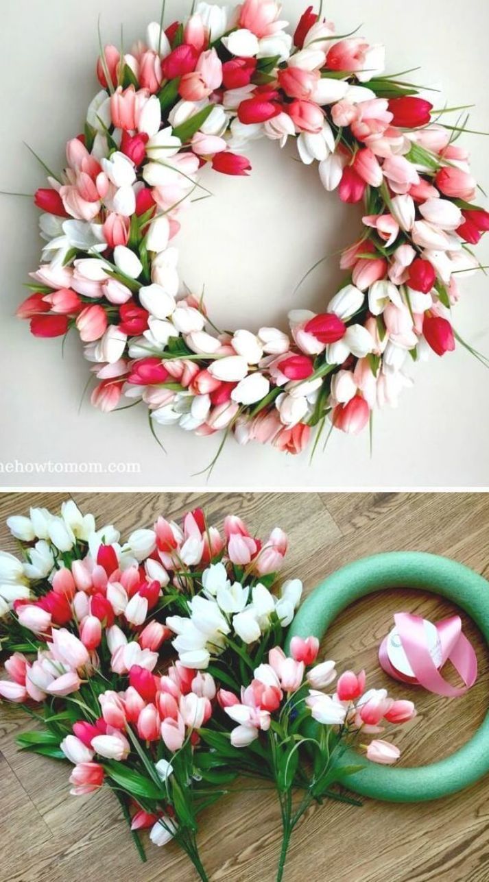 a wreath with pink and white tulips on it