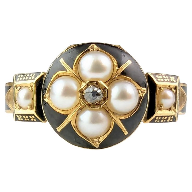 Did you ever lay eyes on such a wonderfully detailed and beautiful mourning ring. I was so excited for this piece to arrive being a lover of mourning jewels and it does not disappoint, everything about it is a work of art. It features a rich 18ct yellow gold band, fully hallmarked and decorated with black enamel depicting the words in Memory Of around the band, the shoulders are raised with small square mounts, finely enameled and each set with a small pearl. The face is not just beautifully designed it is also a hinged locket face, opening up much like the old infamous poison ring design, enclosing two locks of finely woven hair. The front of the locker face is decorated with black enamel and set with four lustrous, plump split pearls with a diamond point to the centre to create a forget Victorian Enamel Ring For Anniversary, Elegant Black Enamel Wedding Ring, Victorian Memorial Jewelry Ring, Black Enamel Round Jewelry For Weddings, Black Enamel Ring For Wedding, Yellow Gold Black Enamel Wedding Ring, Wedding Yellow Gold Enamel Ring With Black Detail, Wedding Yellow Gold Ring With Black Enamel, Heirloom Jewelry With Round Black Enamel