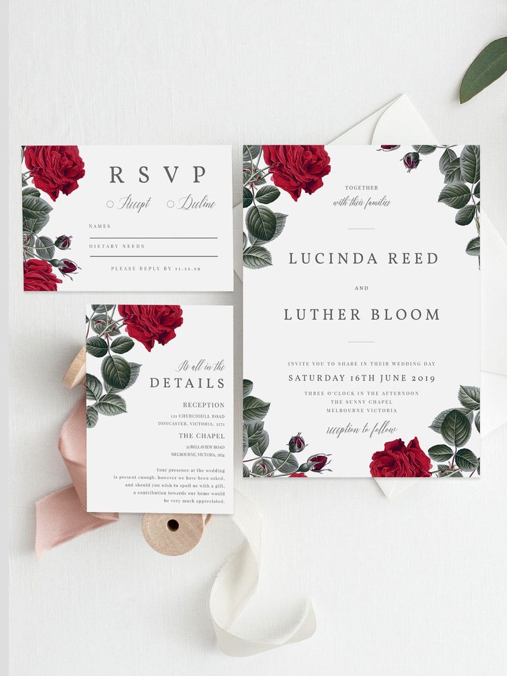 wedding stationery with red roses and greenery