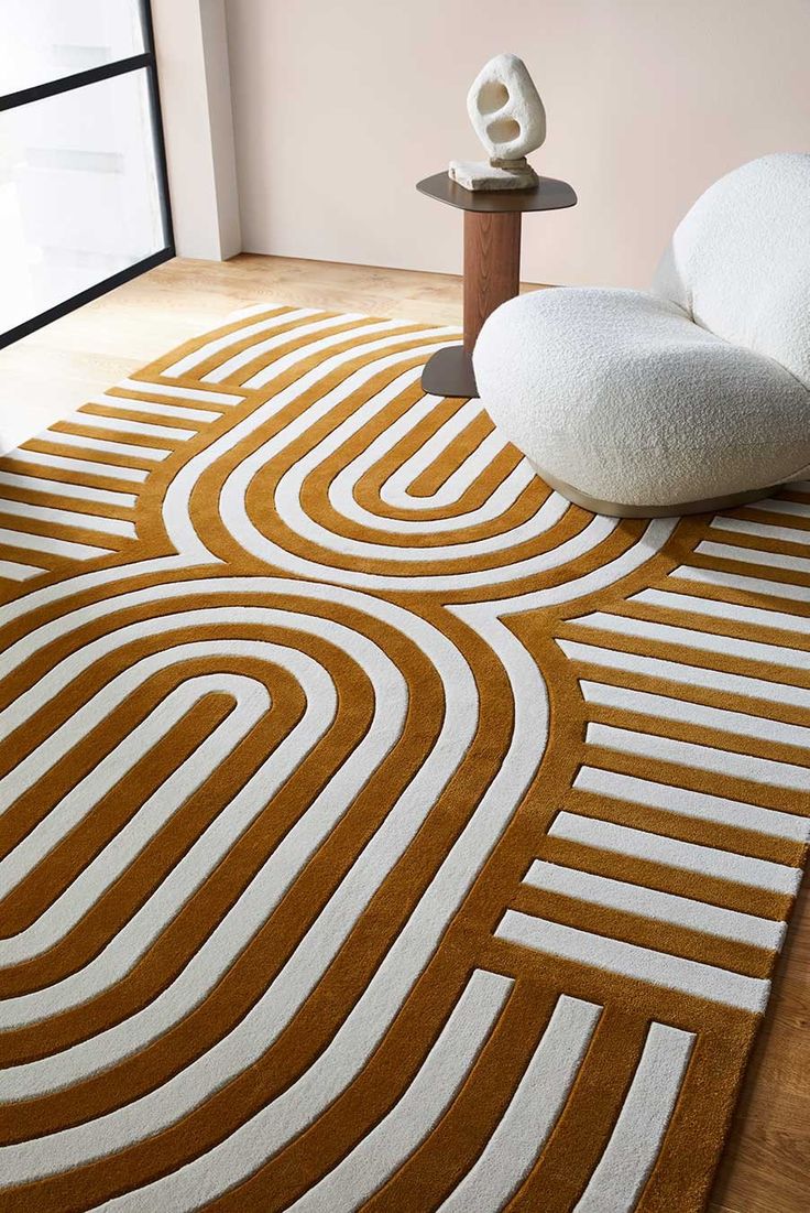 a living room with an area rug that looks like it has been designed to look like a maze