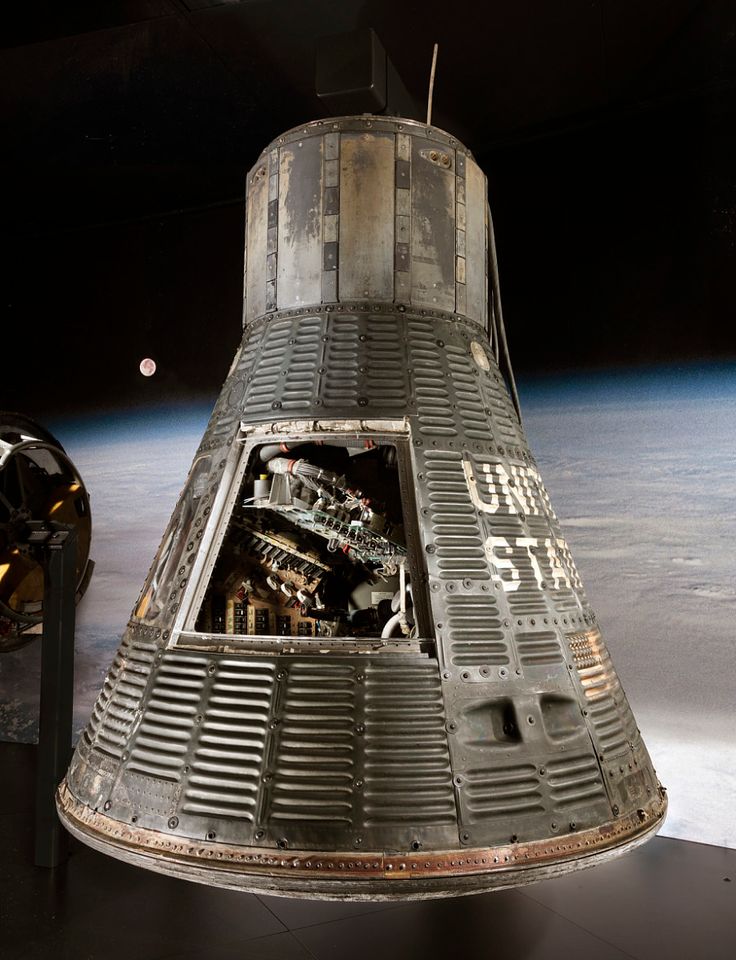 the space shuttle is on display in this image from outer space, with earth in the background