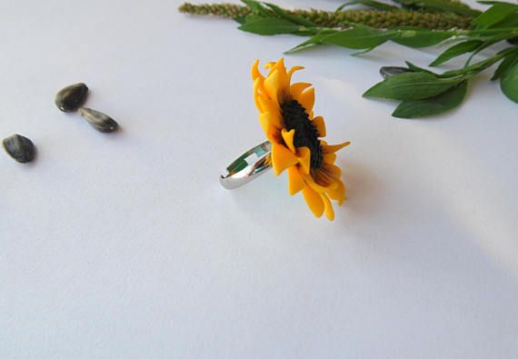 Sunflower ring, flower ring, polymer clay jewelry, gift for her, wedding jewelry, yellow jewelry, bridesmaid jewelry, Bridal jewelry, planted jewelry, wildflowers jewelry, bridesmaid ring, floral jewelry Sunflower ring made by me from polymer clay. The petals are made in a special Yellow Flower Jewelry For Anniversary, Yellow Flower Ring For Anniversary, Yellow Flower Ring For Wedding, Yellow Flower Wedding Rings, Adjustable Yellow Flower Ring For Gift, Yellow Polymer Clay Jewelry For Gifts, Handmade Yellow Rings For Wedding, Ring Polymer Clay, Bridesmaid Ring