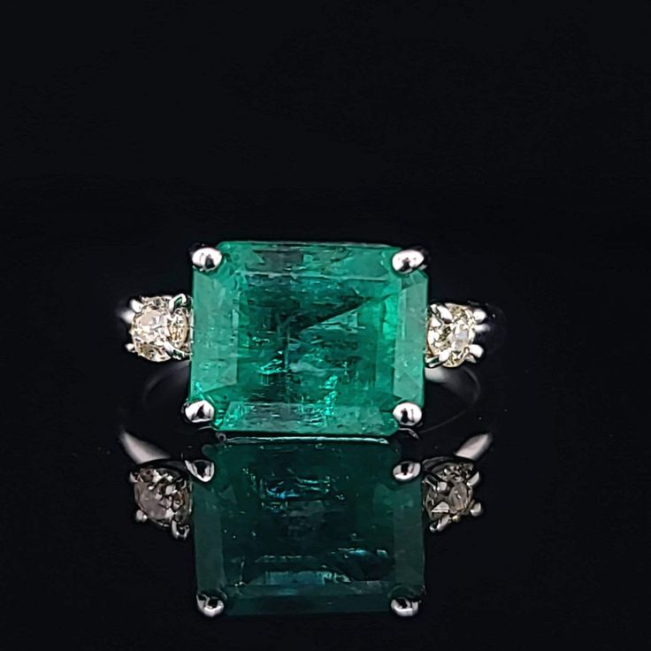 Gorgeous vintage platinum engagement ring gem natural green emerald in emerald shape Center emerald weight 4.47ct. size 10.6x8.5mm gorgeous green color nice luster very lively ,brilliant spakly and clean. side two natural diamonds total weight 0.20ct. J -SI1 ring size 7 Resizable Appraisal available Retail value $9,500 net. Luxury Green Emerald Ring With Diamond Cut, Gia Certified Formal Emerald Cut Emerald Ring, Formal Emerald Cut Emerald Ring With Vvs Clarity, Formal Octagon Emerald Diamond Ring, Emerald Cut Emerald Ring With Vvs Clarity, Gia Certified Green Princess Cut Diamond Ring, Radiant Cut Emerald Ring With Vvs Clarity, Green Diamond Ring With Vvs Clarity And Radiant Cut, Emerald Cut Emerald Ring In Fine Jewelry Style