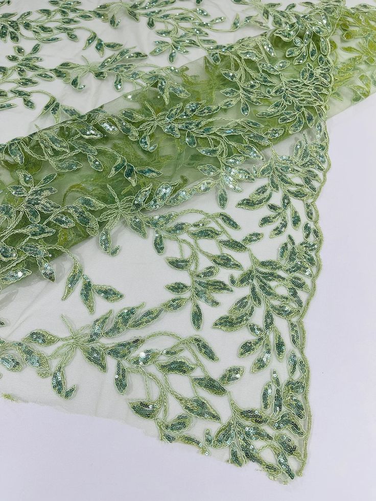 Green Leaf Dress, Green Lace Fabric, Leaf Dress Design, Leaf Fabric, Green Embroidered Sequin Lace Fabric, Green Embroidered Lace Sequin Fabric, Elegant Green Sequin Fabric With Intricate Embroidery, Green Lace Sequin Fabric For Wedding, Elegant Green Embroidered Fabric With Sequins