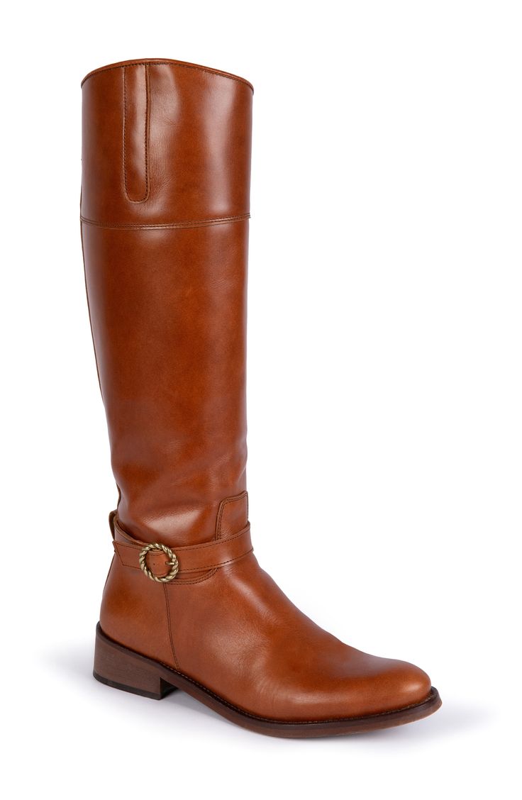 Twisted buckle hardware adds a signature flourish to an equestrian-inspired boot crafted in Spain from smooth, rich leather. 3/4" heel Side zip closure Removable insole Leather upper and lining/rubber sole Made in Spain Leather Boots With Horsebit Detail For Work, Calf Leather Boots With Horsebit Detail And Round Toe, Classic Calf Leather Boots With Buckle, Elegant Leather Sole Knee-high Boots For Riding, Elegant Wide Calf Riding Boots, Elegant Riding Boots With Buckle Closure, Formal Low Heel Boots With Buckle Closure, Elegant Boots With Horsebit Detail For Work, Elegant Calf Leather Boots With Buckle Closure