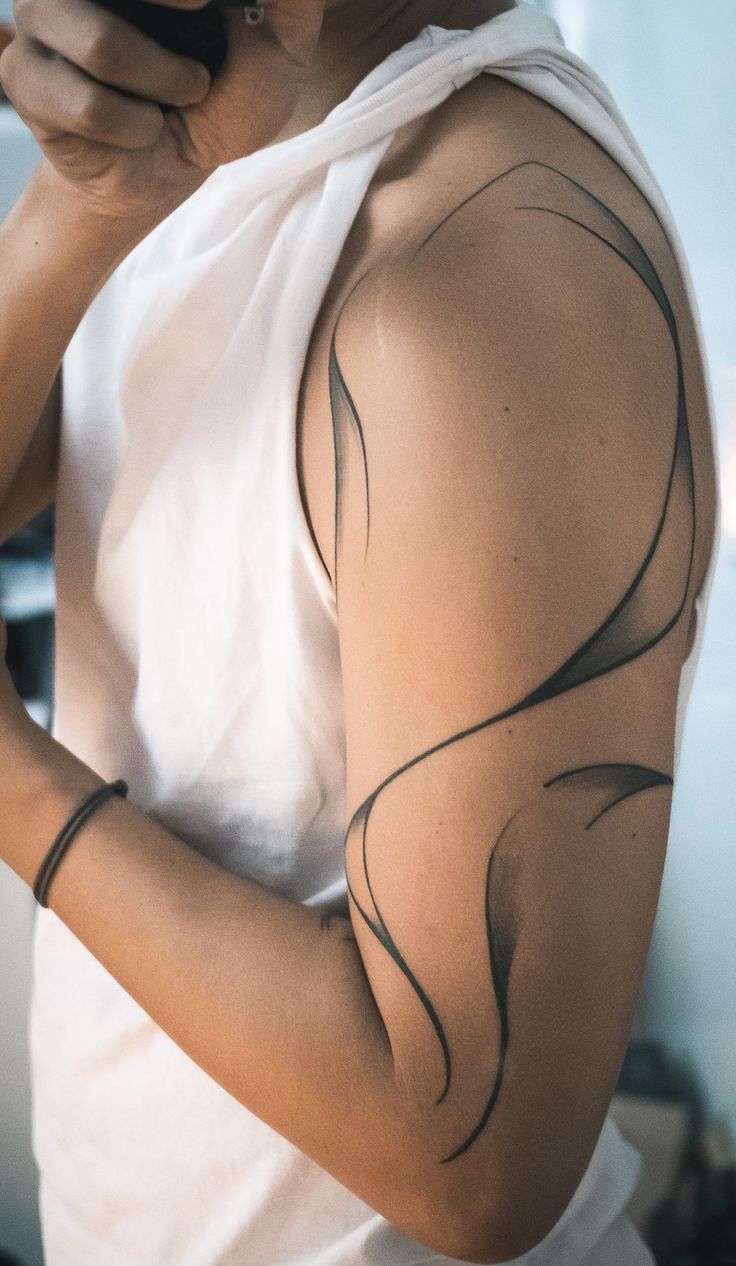 {Latest tattoo  designs and tattoo ideas huge collection of images.} Line Art Shoulder Tattoo, Organic Line Tattoo, Fine Line Abstract Tattoo, Abstract Tattoos For Women, Tattoo Lines Abstract, Line Tattoo Thigh, Solid Line Tattoo, Clear Tattoos, Abstract Lines Tattoo