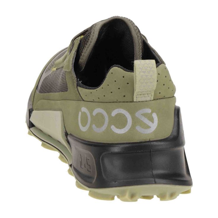 the ecco sneaker in olive green and black is featured with white lettering on the upper part of the shoe