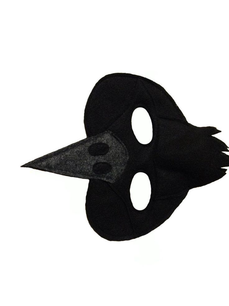 a black mask with two holes in the middle and one hole at the bottom, on a white background