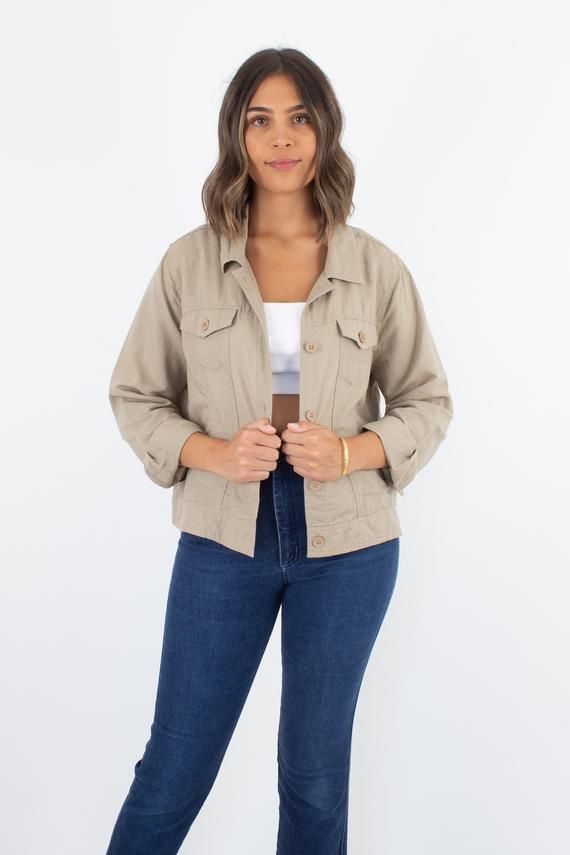 Casual Single-breasted Button-up Cropped Jacket, Khaki Outerwear With Button Closure, Khaki Button-up Utility Jacket With Buttoned Pockets, Spring Blazer With Buttons For Everyday, Everyday Spring Blazer With Buttons, Spring Everyday Blazer With Buttons, Spring Khaki Blazer With Buttoned Pockets, Spring Khaki Utility Jacket With Button Cuffs, Khaki Button-up Utility Jacket With Snap Buttons