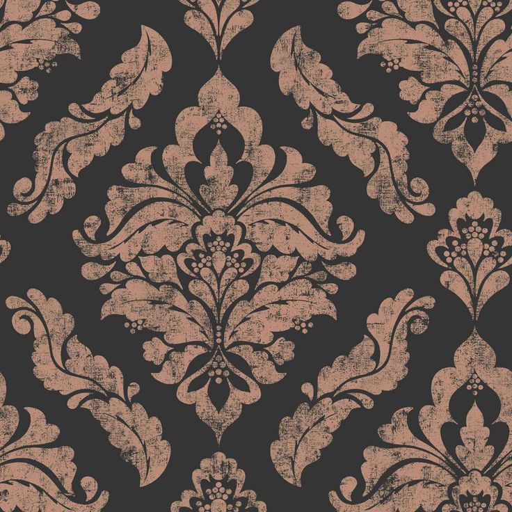 a black and white wallpaper with an ornate design on it's side,