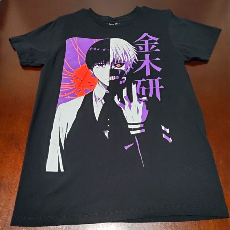 Never Worn Tokyo Ghoul Graphic T-Shirt!! Super Soft And In Brand New Condition! Cool Black Top With Graphic Print, Edgy Graphic Print Top For Cosplay, Edgy Cotton Tops For Cosplay, Cool Black Tops With Graphic Design, Cotton Band Merch Shirt For Cosplay, Black Pop Culture Shirt For Cosplay, Black Pre-shrunk Pop Culture Shirt, Black Screen Print Tops For Cosplay, Black Screen Print Top For Cosplay