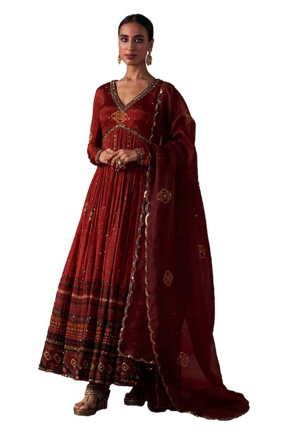 Maroon anarkali featuring butti print all over highlighted with gold dori hand embroidery. Paired with a pant and a sequin embroidered scallop hem dupatta. - Aza Fashions Anarkali Churidar For Ceremonial Festivals, Ceremonial Anarkali Churidar With Zari Work, Anarkali Churidar With Dupatta For Ceremonial Occasions, Ceremonial Anarkali Kurta With Pallu, Anarkali Salwar Kameez For Ceremonial Festivals, Ceremonial Anarkali Salwar Kameez For Festivals, Bollywood Style Churidar With Dupatta For Ceremonies, Ceremonial Anarkali Churidar For Diwali, Anarkali Churidar For Ceremonial Diwali