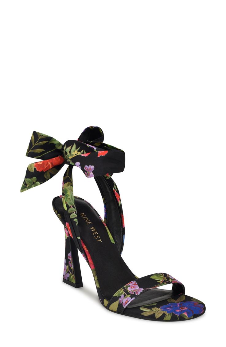 An ankle tie furthers the sweetness of a floral-patterned sandal lofted by an architectural heel for on-trend styling. 3 3/4" heel Textile upper/synthetic lining and sole Imported Spring Formal Lace-up Sandals With 4-inch Heel, Spring High Heel Sandals With Wrapped Heel, Spring Formal Heels With Ankle Tie, Spring Formal Ankle Tie Heels, Adjustable 4-inch Heel Summer Sandals, Spring Heels With Wrapped Heel And Open Design, Ankle Tie Heels For Spring Evening, Ankle Tie Heels For Evening And Spring, High Heel Sandals With Bow For Spring