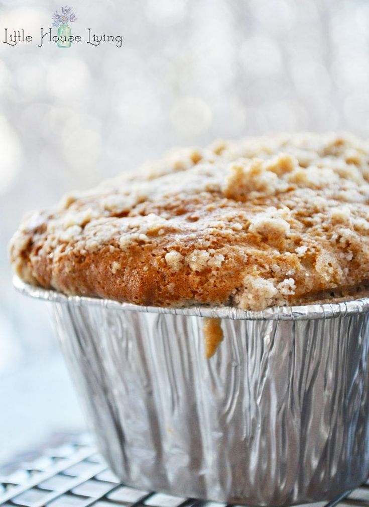 a muffin sitting on top of a metal pan