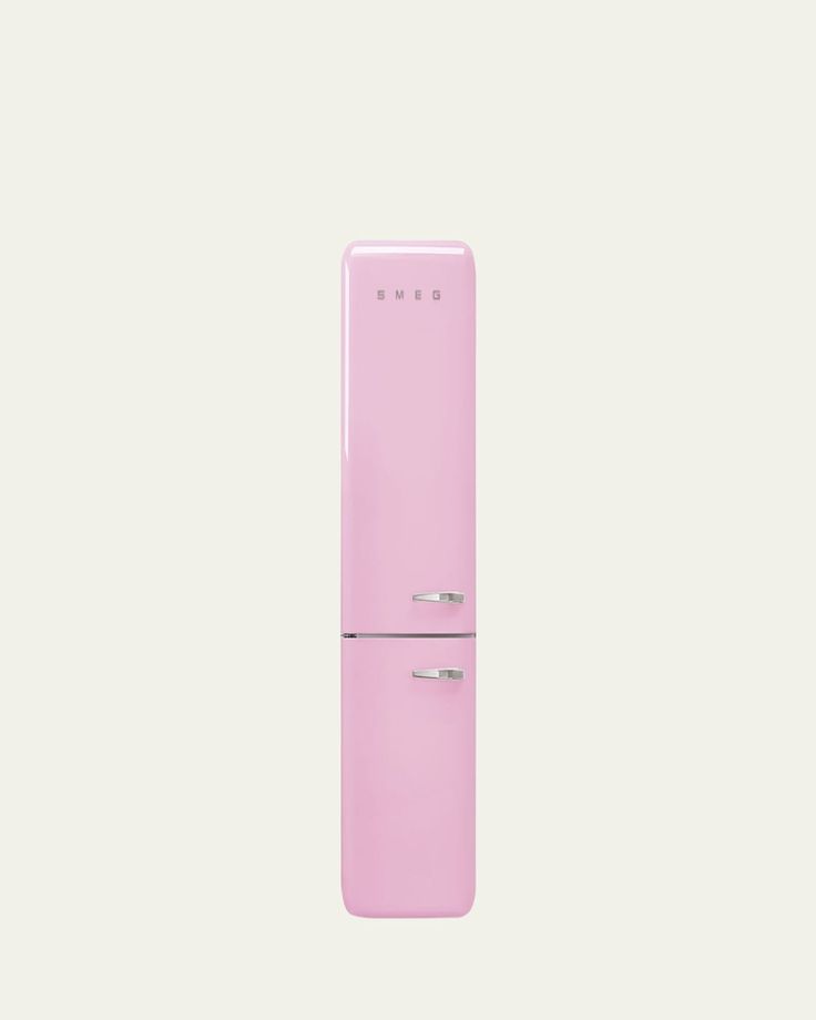 a pink refrigerator freezer sitting on top of a white wall