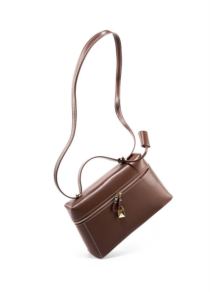 High-end Rectangular Soft Leather Shoulder Bag, High-end Rectangular Shoulder Bag With Metal Hardware, High-end Soft Leather Rectangular Shoulder Bag, High-end Brown Bags With Metal Hardware, Square Leather Satchel With Gold-tone Hardware, High-end Brown Soft Leather Shoulder Bag, Luxury Leather Shoulder Bag In Solid Color, Elegant Leather Box Bag With Metal Hardware, High-end Square Leather Box Bag