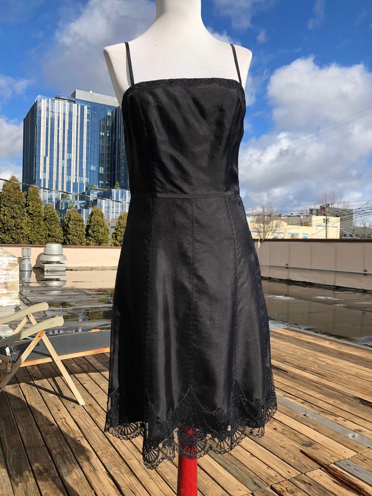 "Shell: 100% silk sheer shimmery voile or organza type. Fully lined in acetate. Size 2 (extra small/Small). Great condition. Side hidden zip. Measurements: pit to pit:17\" across waist:14\" across hip:19\"-20\" bottom hem sweep:28\"/56\" length from top of shoulder: 37.5\"-38.5\"" Evening Dresses With Lace Trim In Organza, Sheer Evening Dress With Spaghetti Straps, Sheer Spaghetti Strap Evening Dress, Sheer Spaghetti Strap Dress For Evening, Elegant Fitted Sheer Slip Dress, Sheer Dress With Spaghetti Straps For Evening, Fitted Sheer Slip Dress For Party, Evening Dress With Sheer Spaghetti Straps, Fitted Silk Slip Dress With Lace Trim