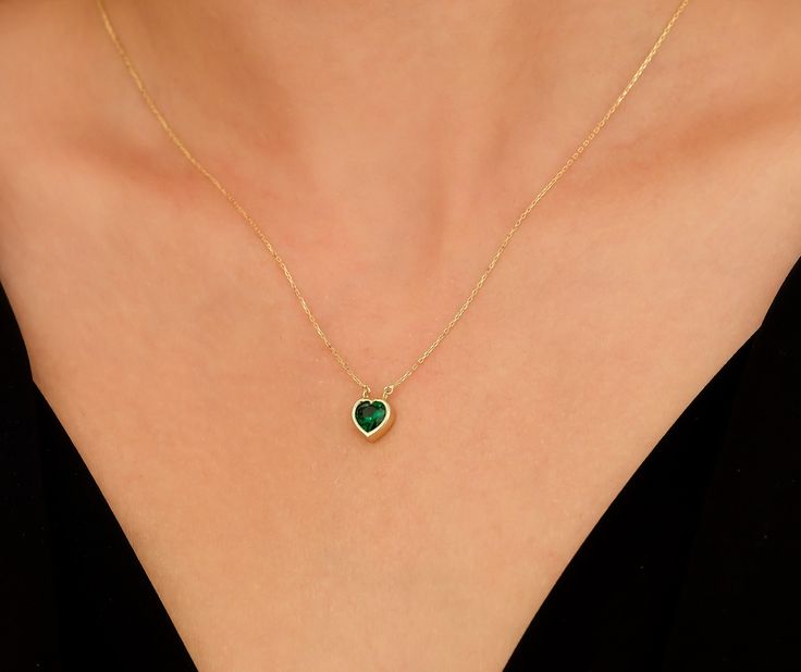 14K SOLID YELLOW GOLD HEART EMERALD NECKLACE Here is a beautiful and simple, yet classy 14k Solid Yellow Gold lab created Emerald Necklace. This is 14k Solid Gold. (We do not sell filled or plated jewelry) Perfect for everyday use.Necklace Length : 16.5 inchesPendant Height : 12.50mmPendant Width : 8mm---Absolutely stunning. Comes in a gift box. Elegant Heart Necklace For May Birthstone, 14k Gold Heart-shaped Jewelry For May Birthstone, Star Wedding Band, Yellow Gold Solitaire, Solitaire Necklaces, Band Jewelry, Emerald Necklace, Heart Of Gold, Engraved Rings