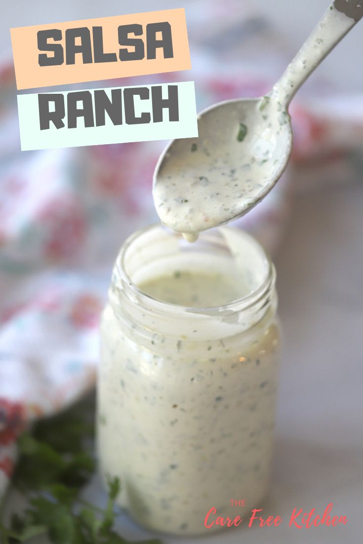 a spoon full of ranch dressing sitting on top of a plate with a sign that says salsa ranch