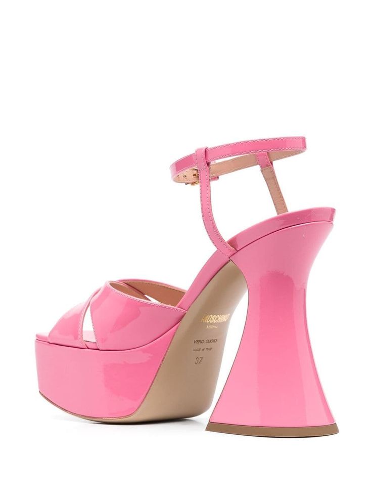 Find MOSCHINO Patent Leather Platform Sandals on Editorialist. pink calf leather patent finish open toe crossover strap detail buckle-fastening ankle strap high heel branded footbed platform sole Luxury Pink Heels With Buckle Closure, Luxury Pink Ankle Strap Sandals, Modern Pink Sandals With Sculpted Heel, Pink Patent Leather Sandals With Sculpted Heel, Patent Leather Platform Sandals With Open Heel, Luxury Pink Sandals With Sculpted Heel, Luxury Pink Sandals With Wrapped Heel, Designer Pink Heels With Buckle Closure, Modern Pink Heels With Buckle Closure