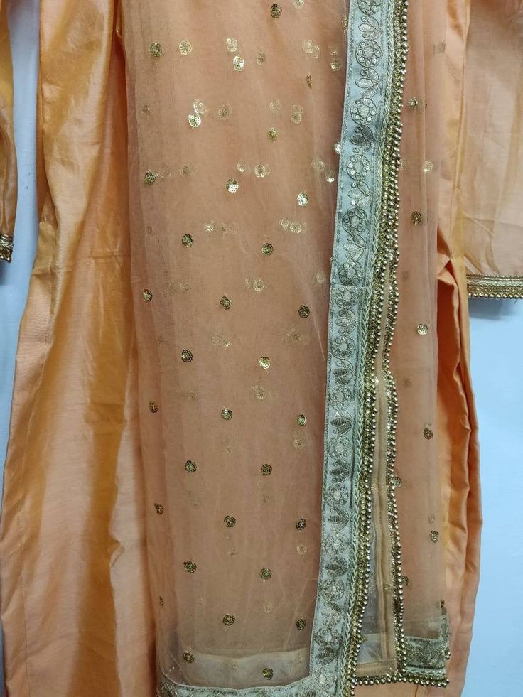 This is a made to measure Salwar Kameez suit I make it exclusively for my customers by using designer fabrics. I will only make it after you confirm your required size details. Handling Time: Don't worry, just tell me, I will process it accordingly and deliver on or before a delivery date you mention. Size: This is custom made as per your size. Post your order I will send you a measuremnts reference sheet using which you can provide details required to make your outfit. Fabric and work: Kameez m Party Wear Chanderi Kurta With Resham Embroidery, Chanderi Kurta With Resham Embroidery For Party Wear, Traditional Party Wear Kurta With Mirror Work, Party Wear Raw Silk Kurta For Eid, Raw Silk Party Wear Kurta For Eid, Eid Party Wear Kurta In Raw Silk, Party Wear Traditional Outfit With Dupatta In Raw Silk, Party Wear Semi-stitched Kurta With Resham Embroidery, Festive Semi-stitched Straight Kurta Salwar Kameez