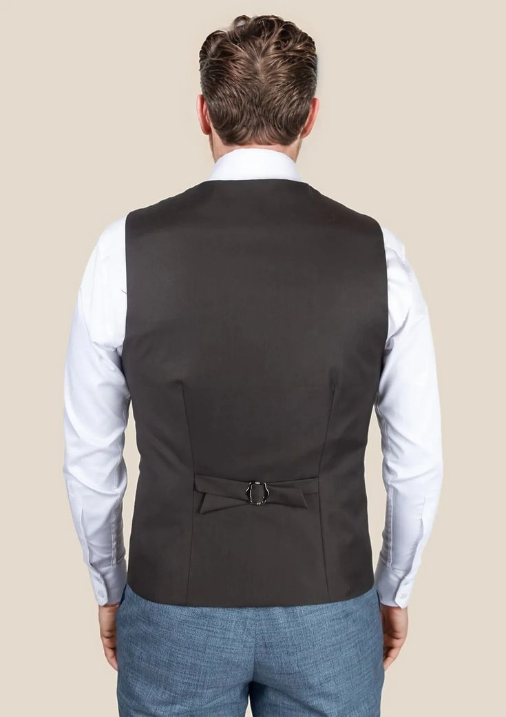 Indulge in timeless sophistication with our Sable Brown Twill Vest. This classic piece exudes elegance and luxury and is custom made from Super 120s pure merino wool to elevate your style. It's the perfect addition to your wardrobe. Fitted Black Cashmere Outerwear, Classic Fitted Outerwear For Black Tie Event, Elegant Tailored Outerwear For Black Tie Event, Elegant Wool Outerwear Custom Fit, Elegant Black Cashmere Outerwear, Elegant Winter Fitted Suits, Elegant Custom Fit Outerwear For Fall, Timeless Fitted Winter Suit, Elegant Slim Fit Winter Suits