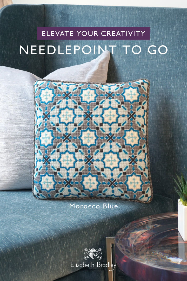 a blue couch with pillows on it and the words elevate your creativity needlepoint to go