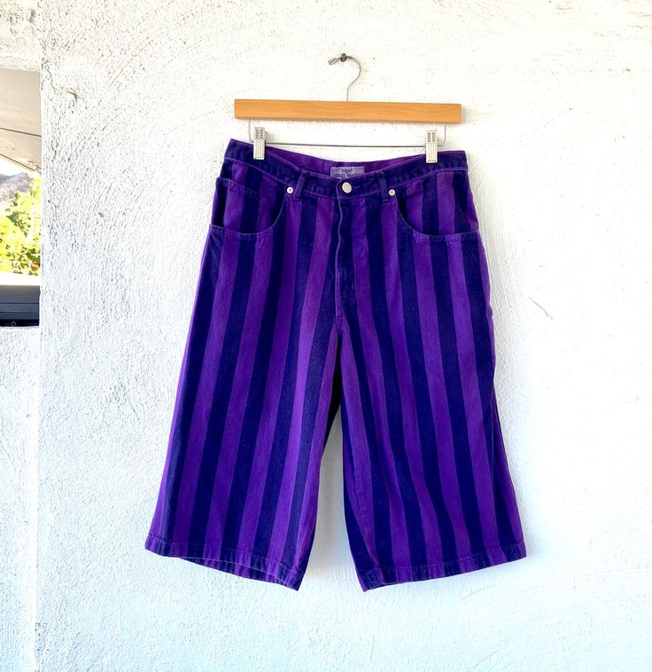 The best early hip hop long denim shorts in the coolest color combo!! Very iconic and in perfect condition! S p e c i f i c s . . . Label: Guess by Georges Marciano Tagged Size: 20 (this is probably not American size) Approx Fit: Mens >> XS - S Color: Purple // Black // White Material: Denim // Zipper Fly Condition: Overall in Amazing Vintage Condition 90s Cotton Shorts For Streetwear, 90s Style Cotton Shorts For Streetwear, Retro Blue Jean Shorts For Streetwear, Vintage Cotton Jean Shorts For Streetwear, 90s Blue Jean Shorts For Streetwear, Purple Streetwear Shorts For Spring, Purple Shorts For Spring Streetwear, Purple Spring Streetwear Shorts, Vintage Blue Shorts For Streetwear